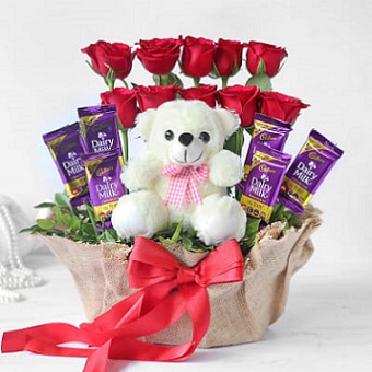 6 dairy milk chocolates with 10 Red Rose Teddy in the same basket